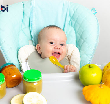 When do babies start eating solid foods?